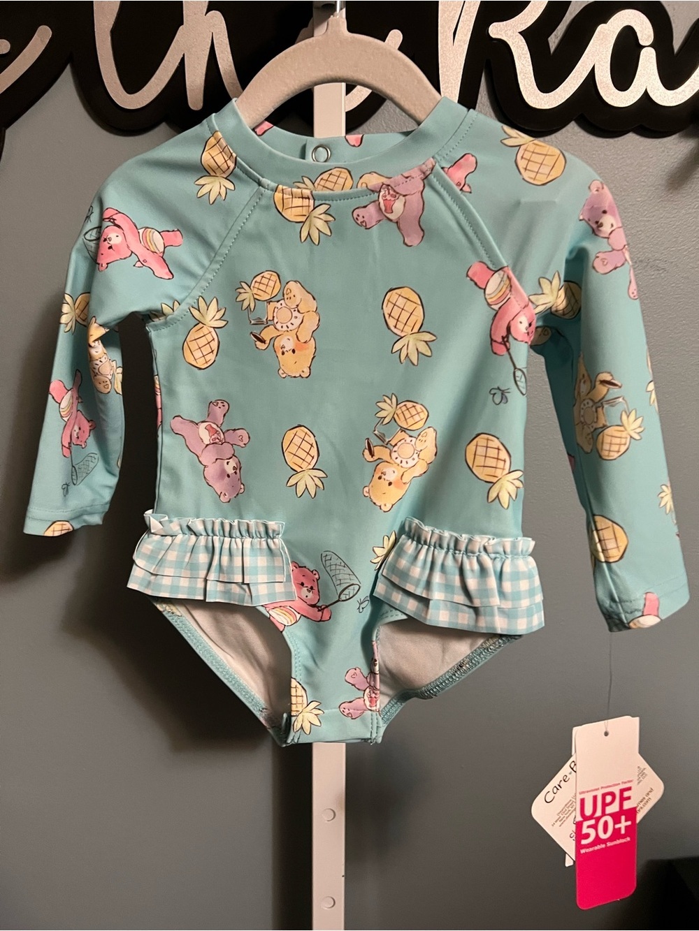 Care Bear Baby Pastel Pineapple & Bear Ruffle UPF 50+ Swimsuit NWT 6-9 months